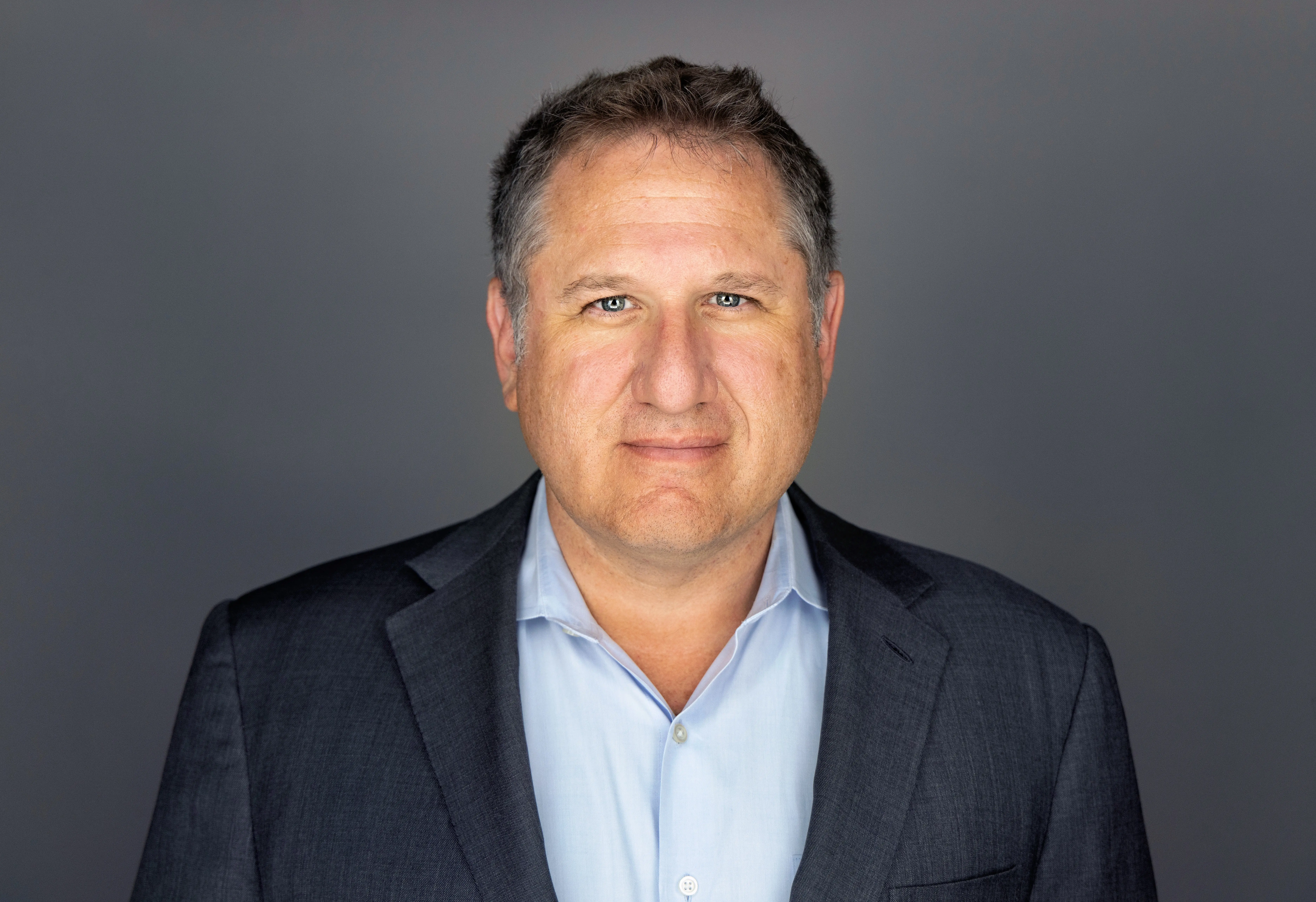 Photo of Sam Gustman